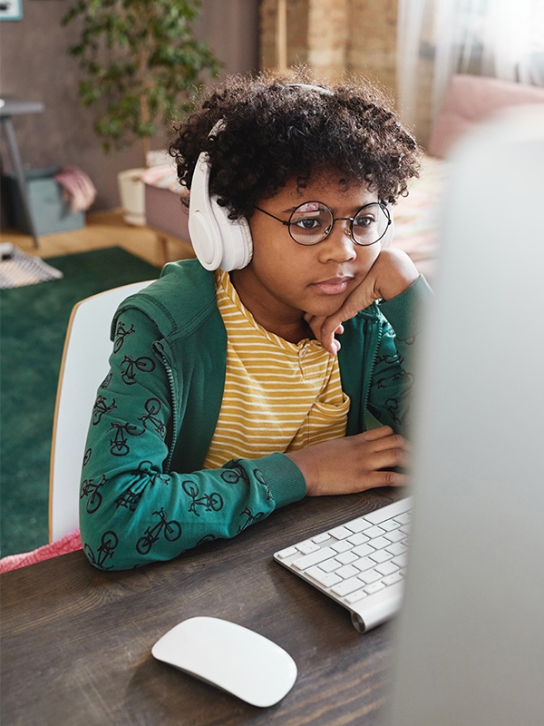 boy watching video on computer 2023 11 27 05 09 26 utc (1)