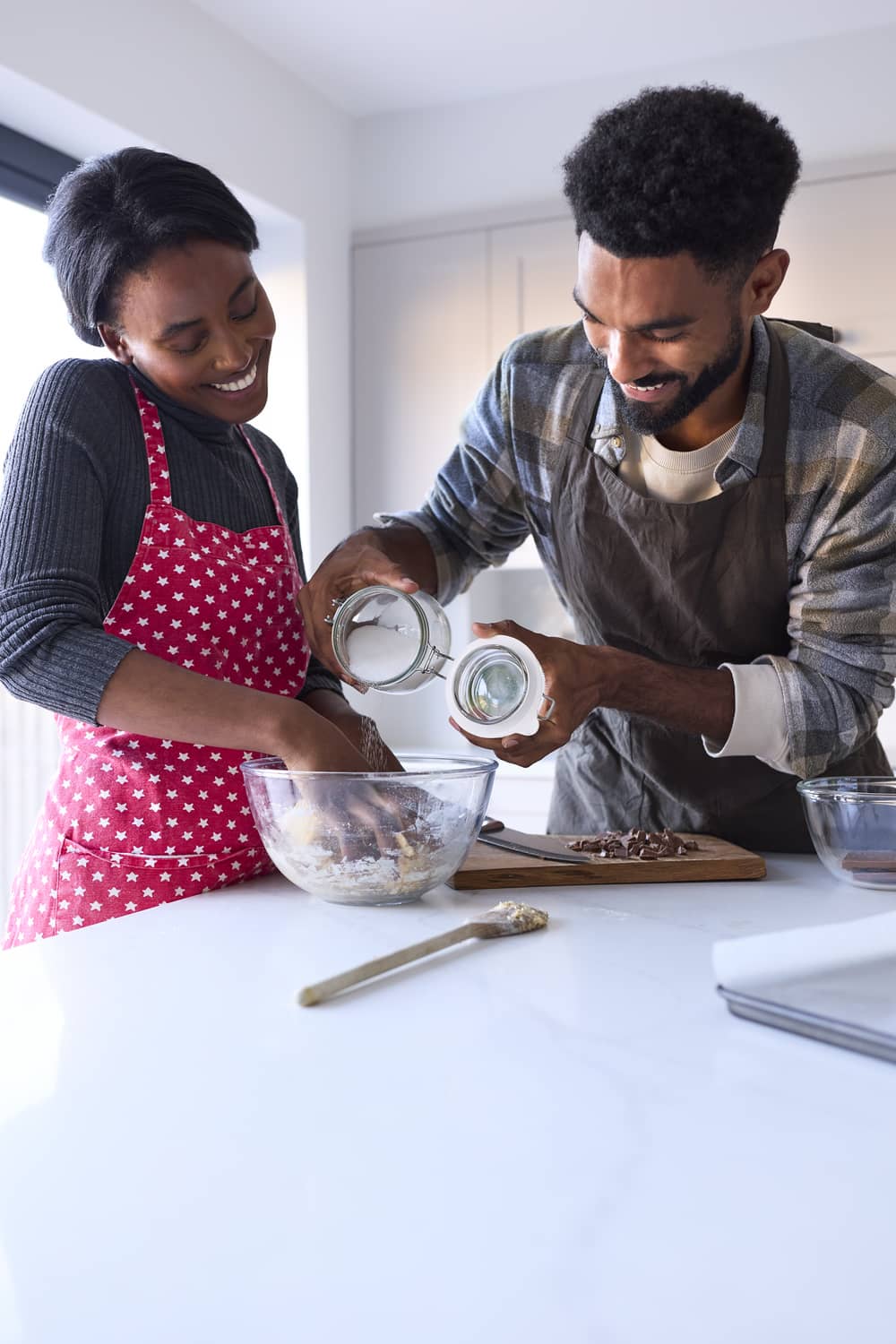 couple at home baking cake together in kitchen 2024 10 21 00 35 11 utc (1)
