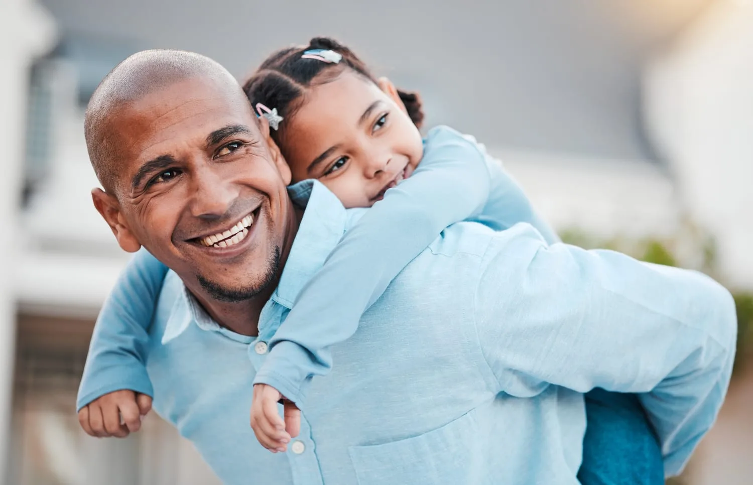 family smile and dad with girl on back relax in h 2023 11 27 05 08 39 utc (2)