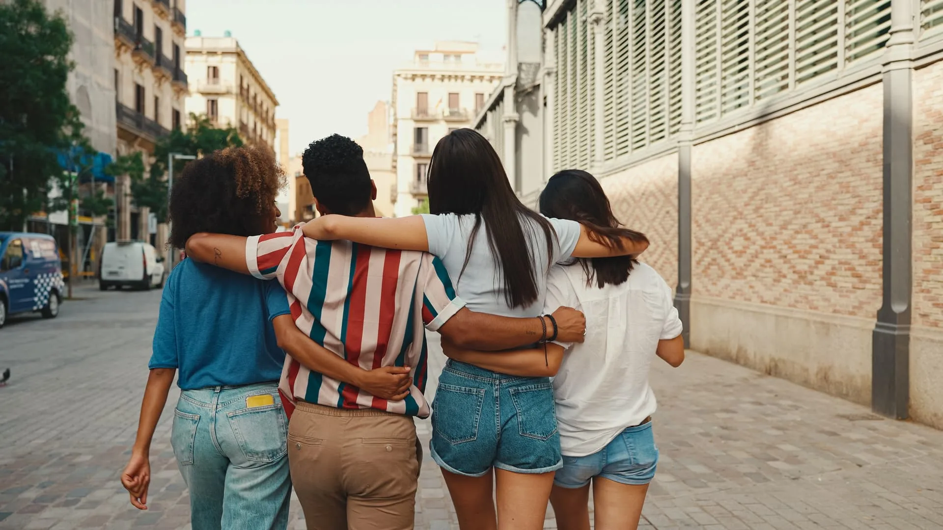 happy multiethnic young people walk embracing on s 2026 01 05 06 00 22 utc (1)