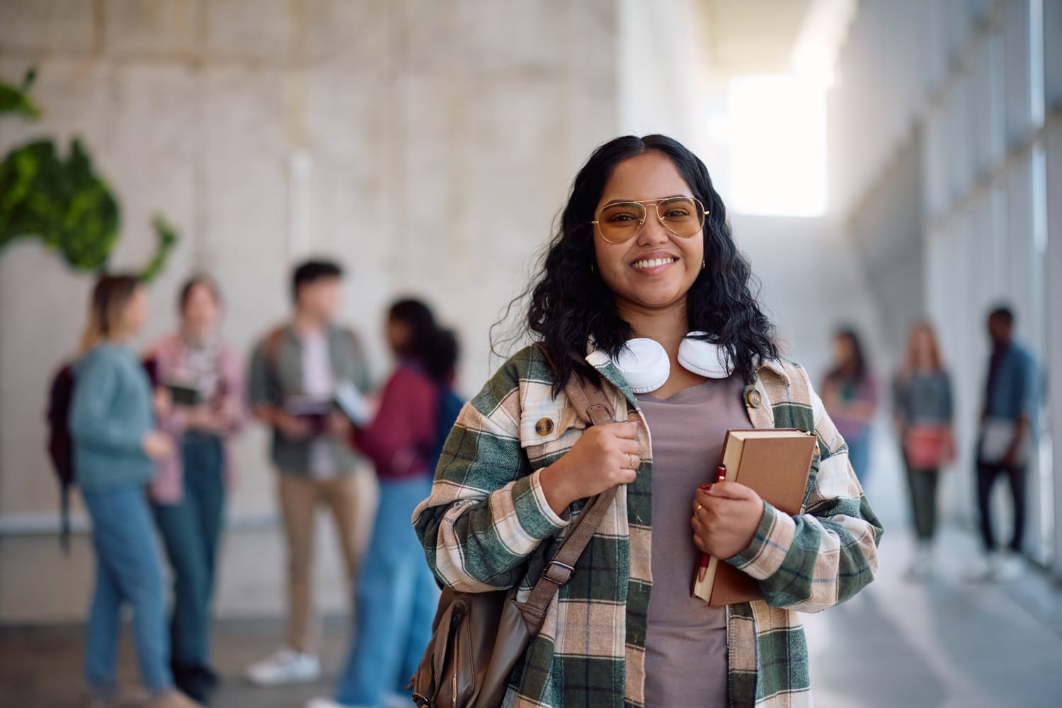 portrait of happy indian female student looking at 2025 05 13 09 31 56 utc (1)