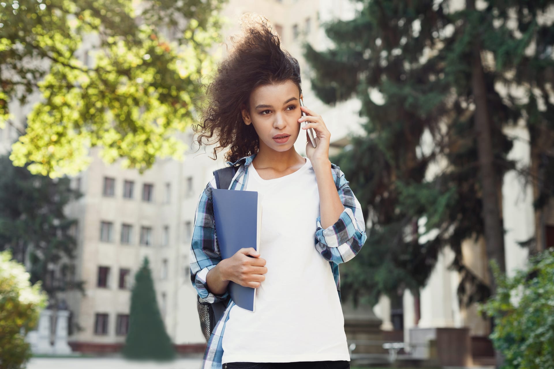 student girl with backpack and mobile at universit 2026 01 11 11 12 30 utc (1)